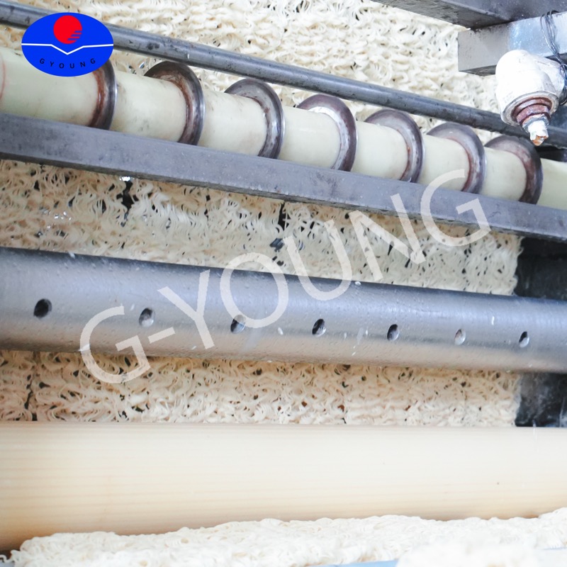 Noodle cutting and shaping machine